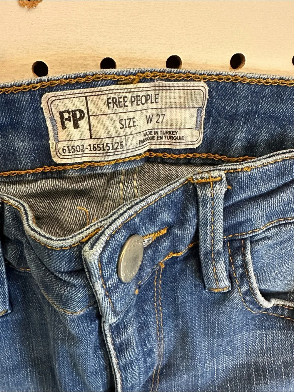 Free People Mid-Blue Flared Jeans with Frayed Hem